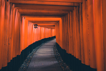Fushimi Inari Shrine is an important Shinto shrine in southern Kyoto, Japan. It is famous for its thousands of vermilion torii gates, which straddle a network of trails behind its main buildings