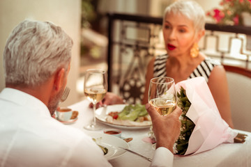 Man and woman having romantic dinner at the weekend