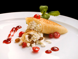 Thin pancakes with cottage cheese and jam. Healthy traditional breakfast concept. close up