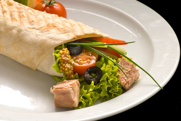 Chicken doner kebab and fresh vegetables in roll of pita bread lavash - Durum Chicken Doner Kebab