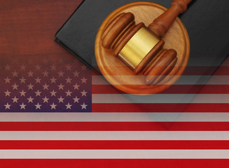 Judge wooden gavel and legal book with usa flag