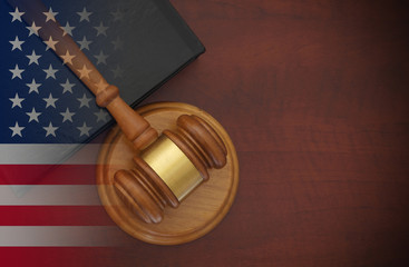 usa law concept, wooden gavel and legal book on table with usa flag