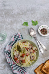 Stewed vegetables with sausages
