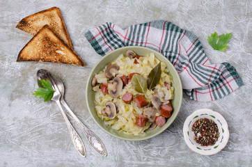 Stewed vegetables with sausages