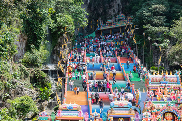 Fototapeta na wymiar Batu Caves is a limestone hill that has a series of caves and cave temples in Gombak, Selangor, Malaysia