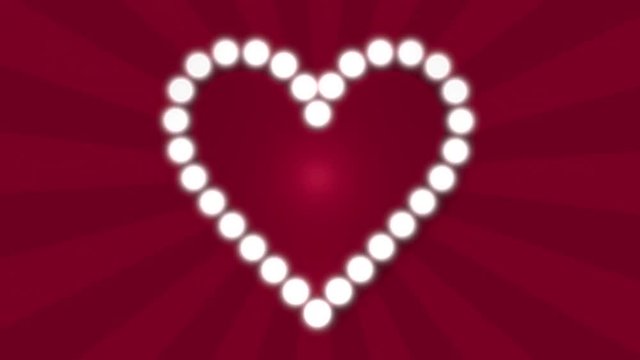 Love heart flashing blubs on red sunbeam background, retro style neon light. Loop animation background. Love, marriage concept
