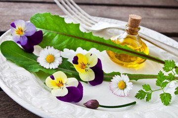 Fresh salad with various eatable flowers