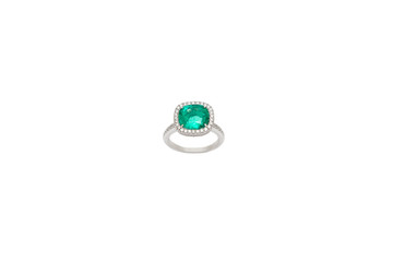 Diamond ring with green precious gem and diamonds. White golden ring on white background. Fashion luxury accessories