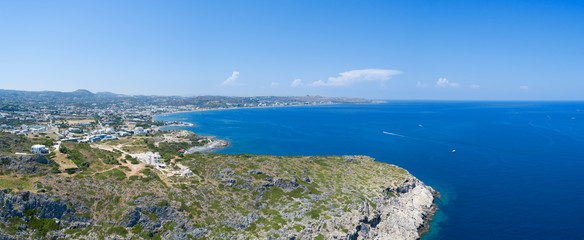Panoramic view of Rhodes island, Greece. Beautiful panorama of creek and village with blue sky.