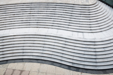 Abstract stairs in black and white, abstract steps, stairs in the city, granite stairs,wIde stone stairway often seen on monuments and landmarks,wide stone stairs, steps,black and white photo,diagonal