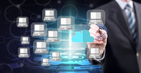Obraz premium Man touching a cloud computing concept