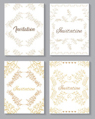 set invitation cards with leafs golden calligraphy