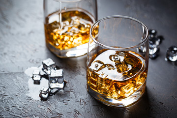 Glasses of whiskey with ice