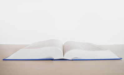 a lot of books. isolated on white background. copy space. study of the bible. open book, reading
