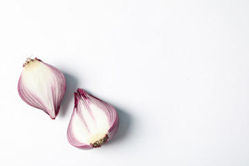 Flat lay composition with red onion on white background