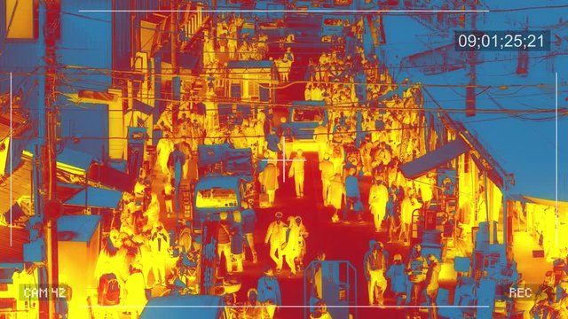 Infrared CCTV camera filming people in a city public space. Surveillance monitoring concept