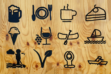 holiday symbols burned on a wooden board
