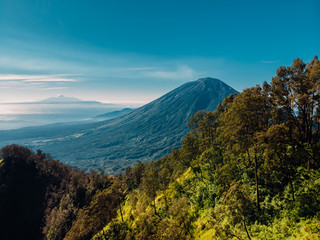 Aerial view of Agung volcano and mountain with forest in Bali, Indonesia