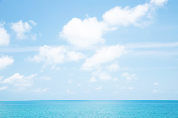 Obraz premium Sea waves in ocean wave splashing thinly ripple water. Blue water and sky background.