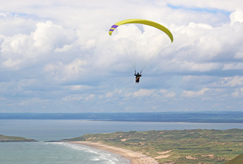 Paraglider above Rhossili in Wales