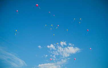 balloons in the sky. blue sky. launch balloons into the sky