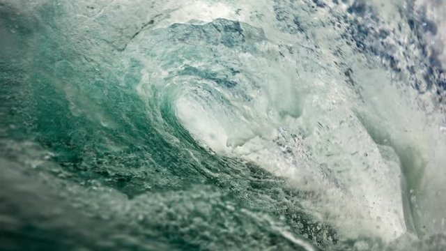 animated photograph of the barrel of a wave in southern California, a high shutter speeds shot turned into a moving masterpiece.