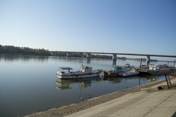 River station, boats. river. at sunset, the tourists on Board to enjoy cocktails with the sunset. focus on the boat.