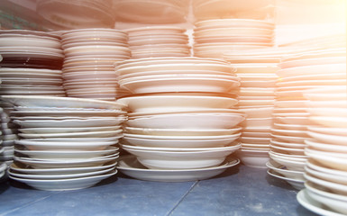 dishes. clean the plates. stack of empty plates