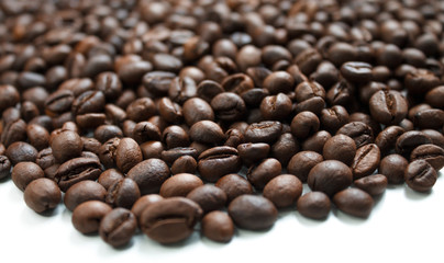 coffee beans brown on white isolated background with close-up location with blurred background