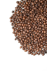 brown coffee grains on a white isolated background with space top view
