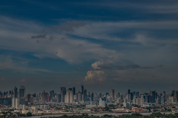 Fototapeta premium Sky view of Bangkok evening view with skyscraper in the business district in Bangkok, Thailand. City View Urban Downtown Business District Concept.