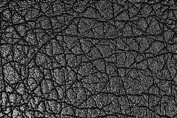 Black eco leather in macro abstract close up with relief texture