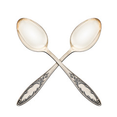 The concept of delicious food. Two spoons on an isolated white background.