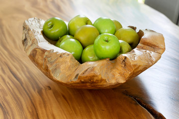 Green apples wood bowl detail macro interior design
