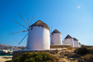 Fototapeta na wymiar Famous mills on Mykonos island. . Beautiful morning on greek island..