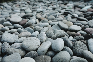 Fototapeta na wymiar boulder pebble beach Stones background Seamless Tileable Texture