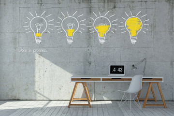 Modern minimalist workstation with business icons and doodles sketched on a concrete wall above a...