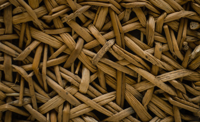 straw. woven texture. wall of straw. Weaving texture or weaving pattern background in macro style. Weaving texture classic retro background for design.