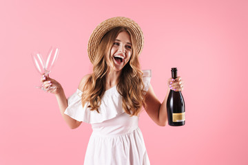 Beautiful young blonde girl wearing summer dress