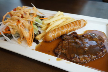 grilled pork steak with french fries
