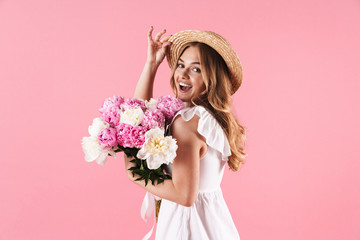 Beautiful young blonde girl wearing summer dress