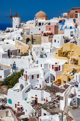 Fototapeta premium traditional white houses in Santorini, Cyclades islands Greece - amazing travel destination