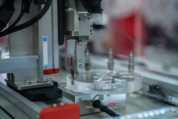 automation machine and detail close up in machine automatic with robotic automation technology for technology production factory