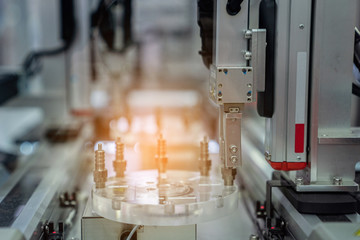 automation machine and detail close up in machine automatic with robotic automation technology for technology production factory