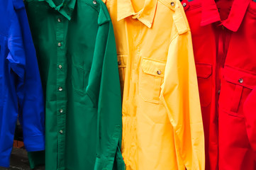 Colorful shirts for sale at the carnival.