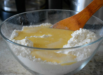 kneading the dough for the cake