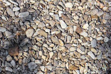 Natural stone texture. River pebbles background. Copy space.