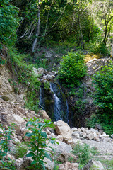 small waterfall, picturesque mountain landscape