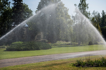 Garden automatic irrigation system watering lawn.