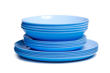 Pastel blue plates on white background isolation